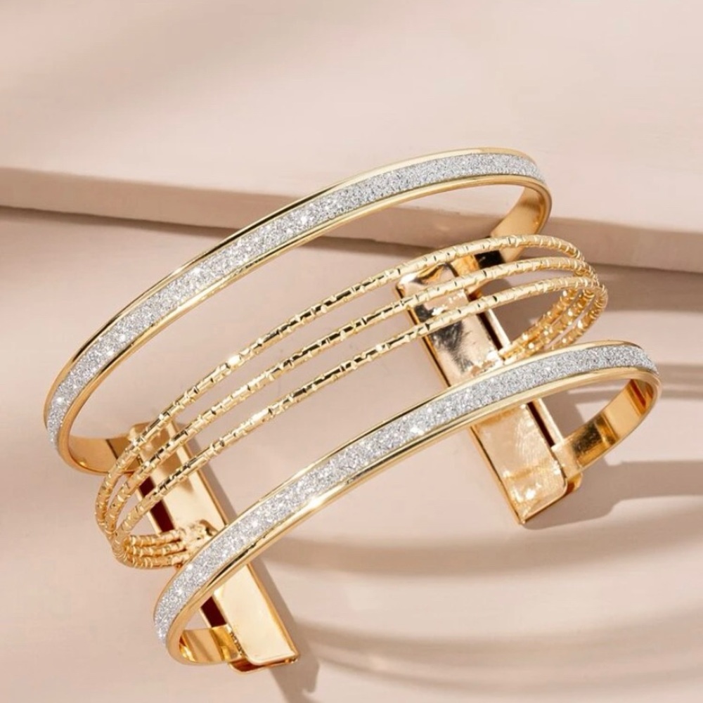 - Gold and glitter cuff